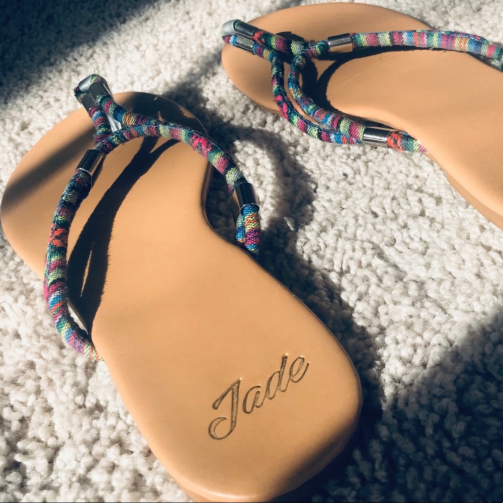 Tan color sandals.